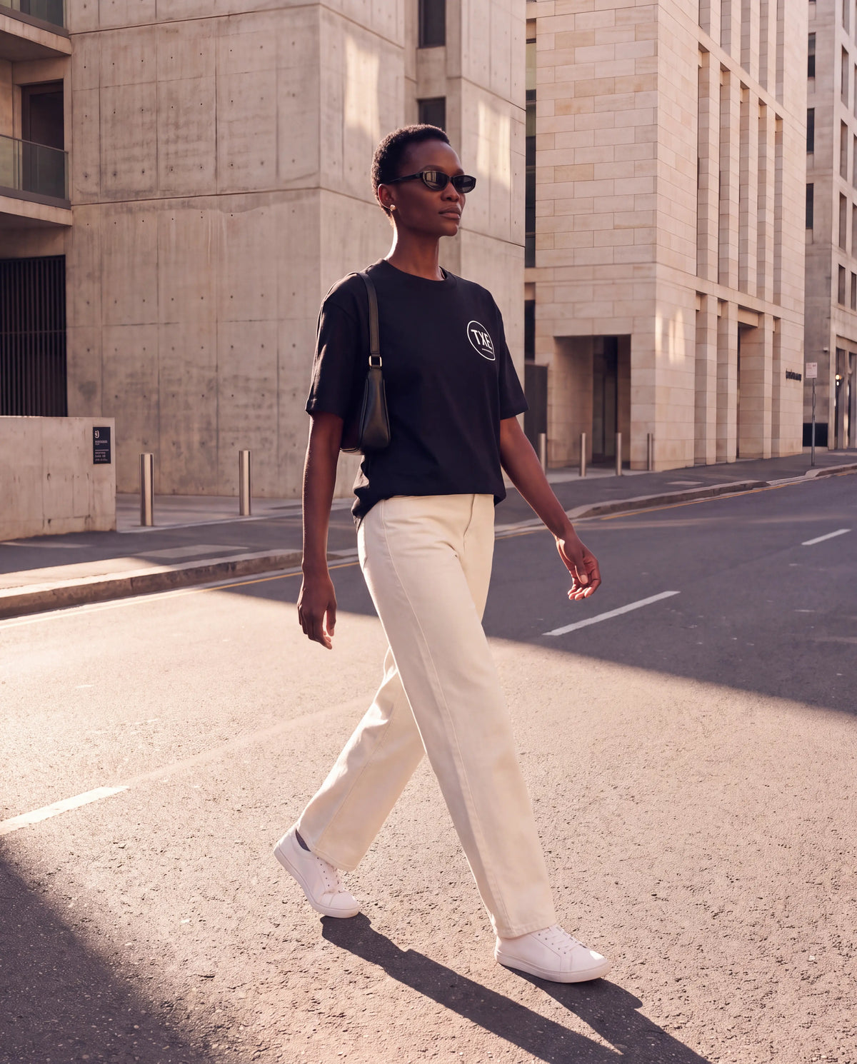 The Signature Tee in Black, street style front