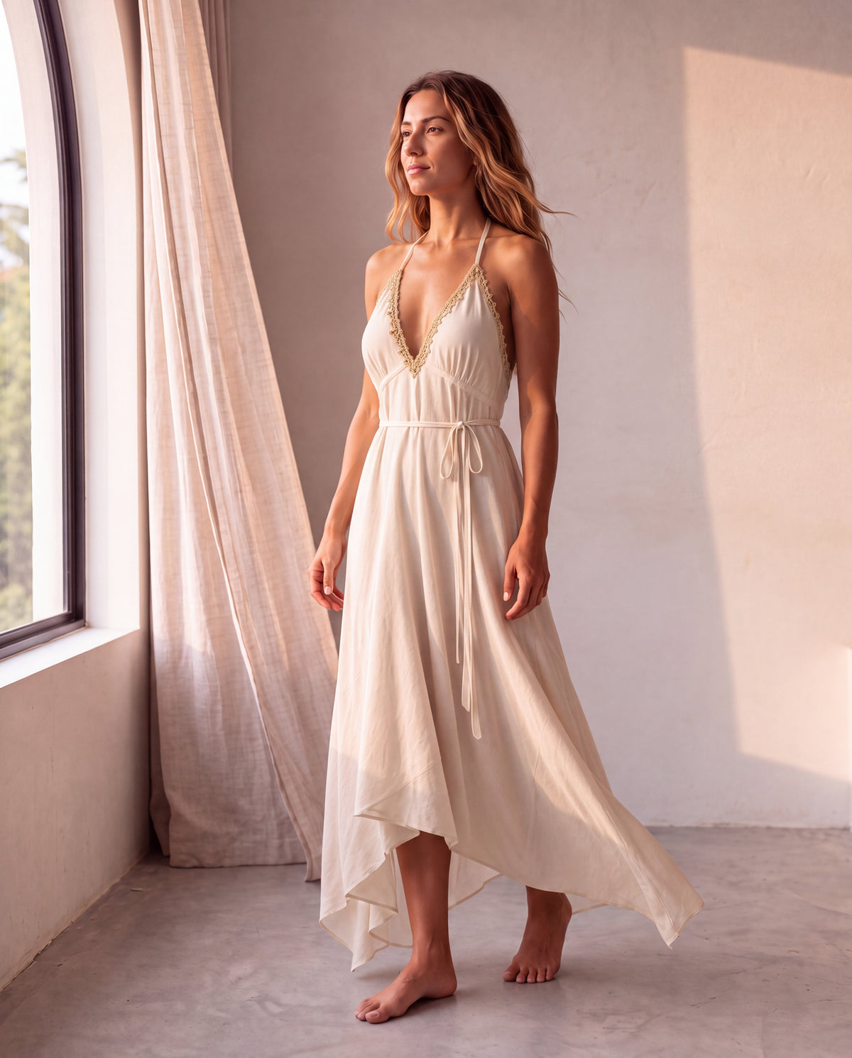 The Amalfi Dress in Crema, in movement