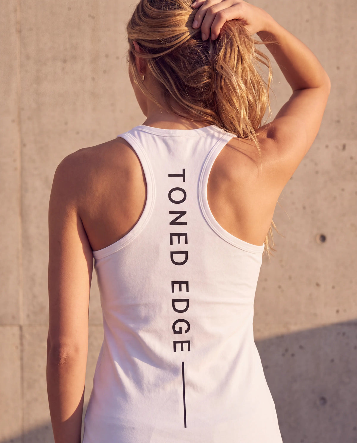 The Spine Tank in White, spine print detail