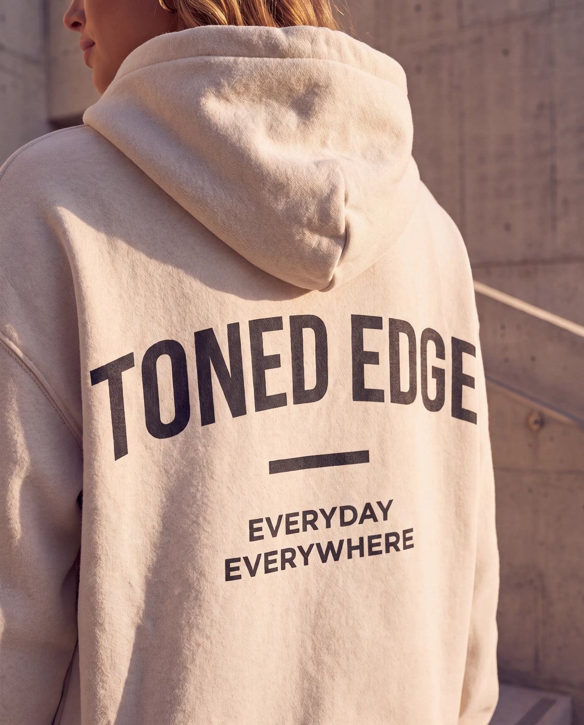 The Signature Hoodie in Bone, back print detail