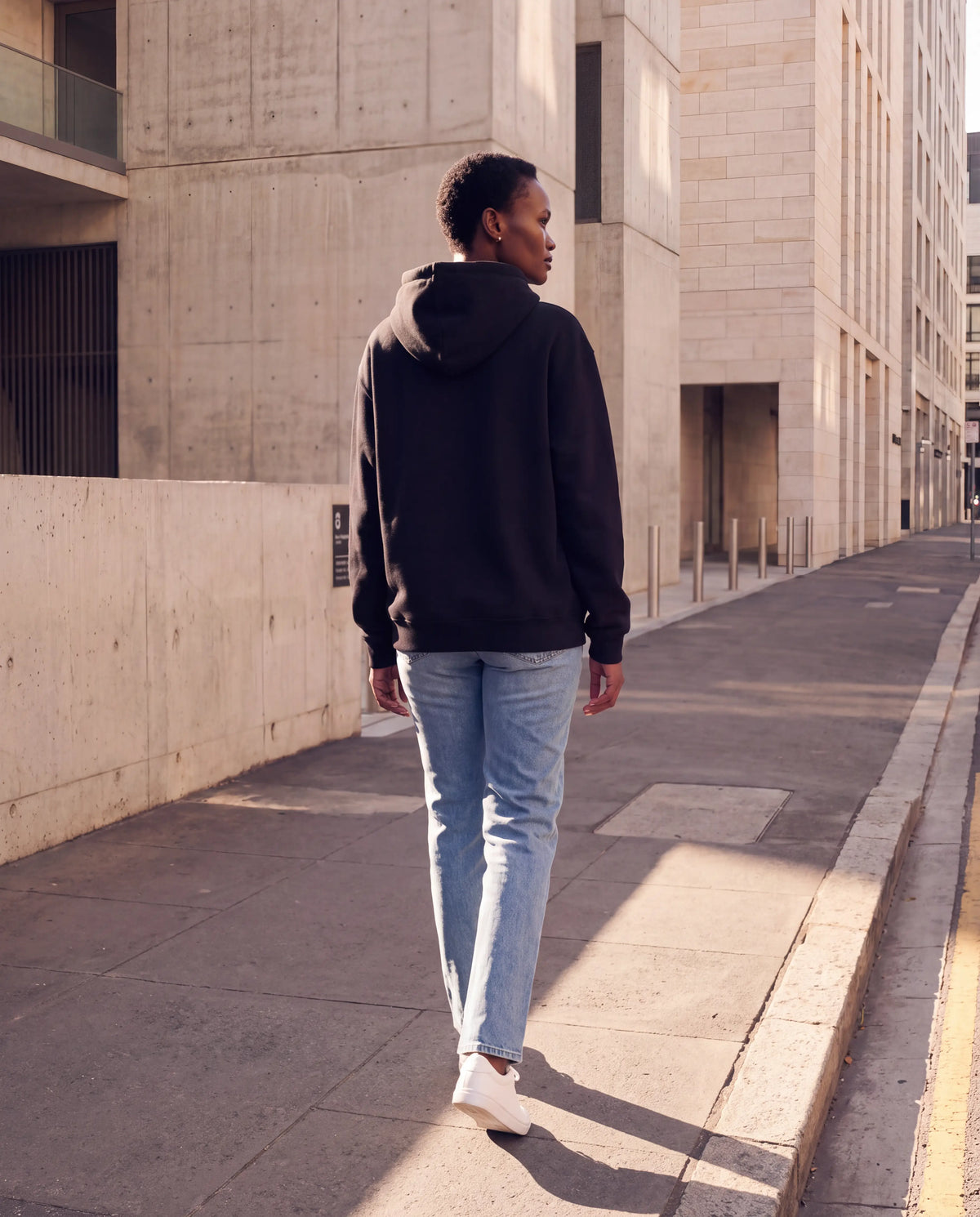 The Everyday Hoodie in Black, back view