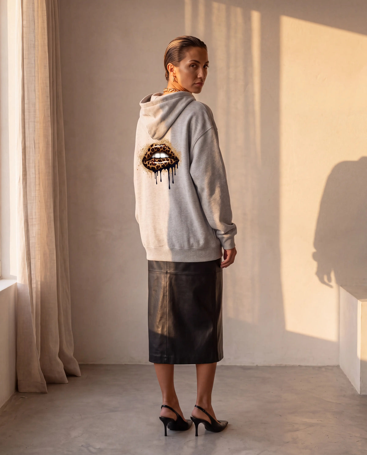 Wild Bite Hoodie in grey, back print with leather skirt