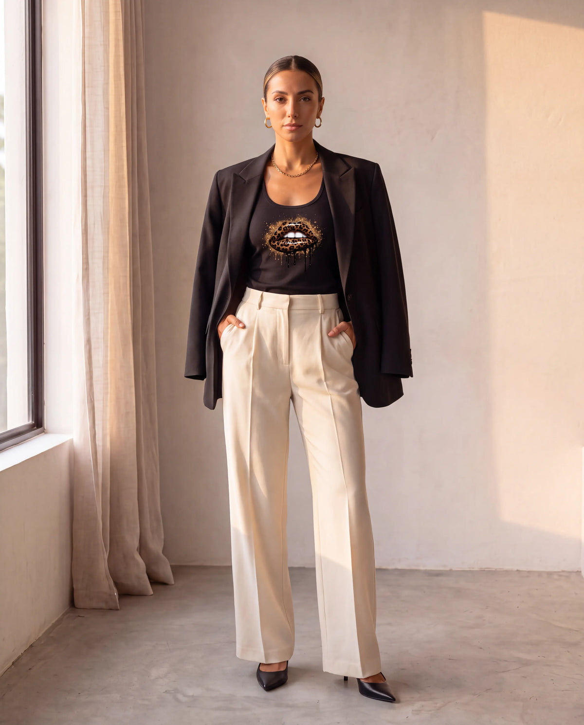 Wild Bite Racerback in black with tailored trousers
