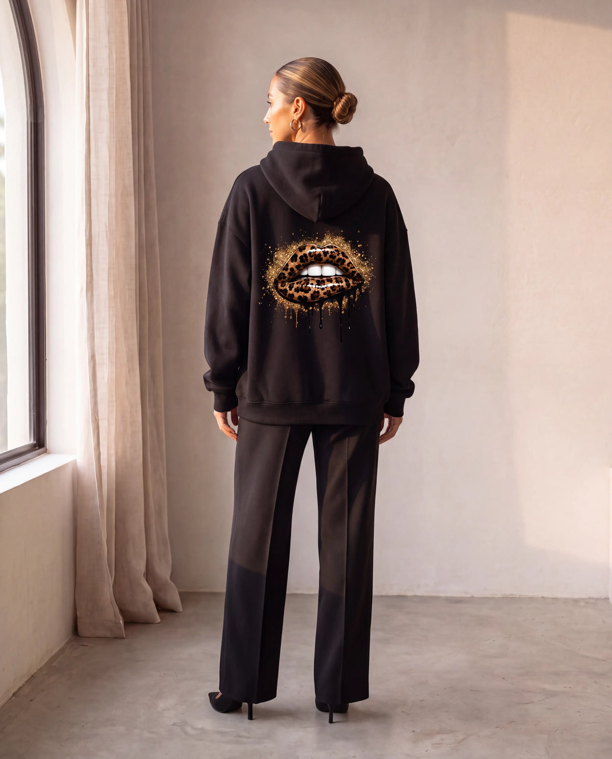 Wild Bite Hoodie in black, back print