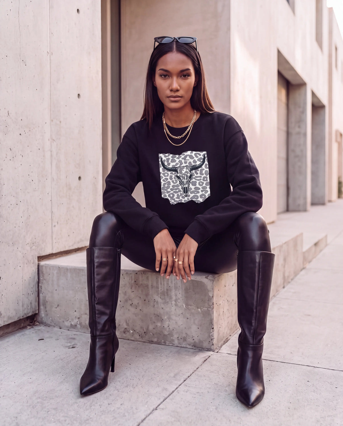 Leopard Legacy Sweater in black seated