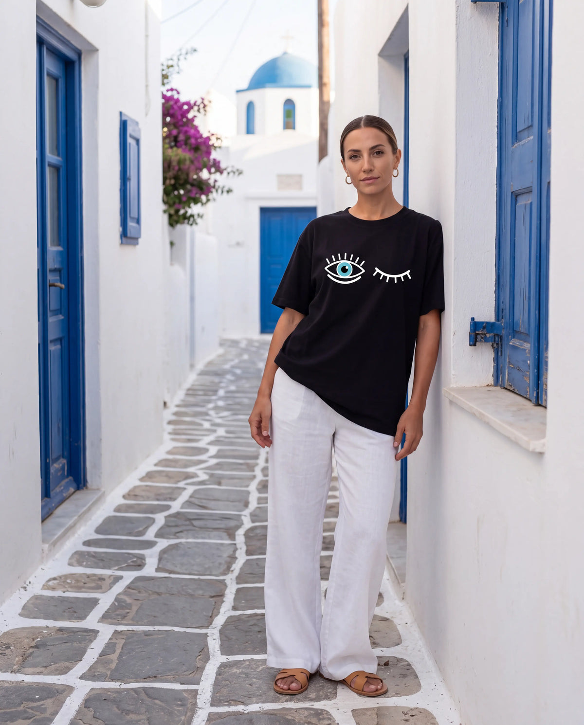 Optic Oversized Tee in Black with open and winking eye chest print