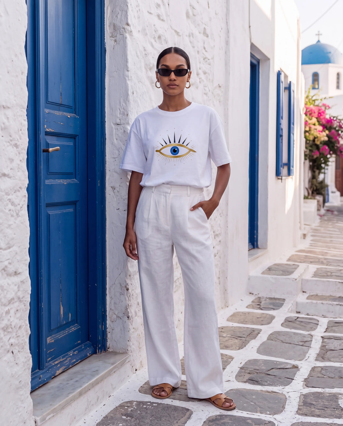 Mati Oversized Tee in White with gold evil eye chest print
