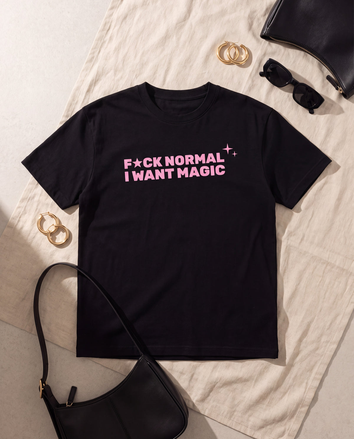 The Want Magic Tee in Black flat lay