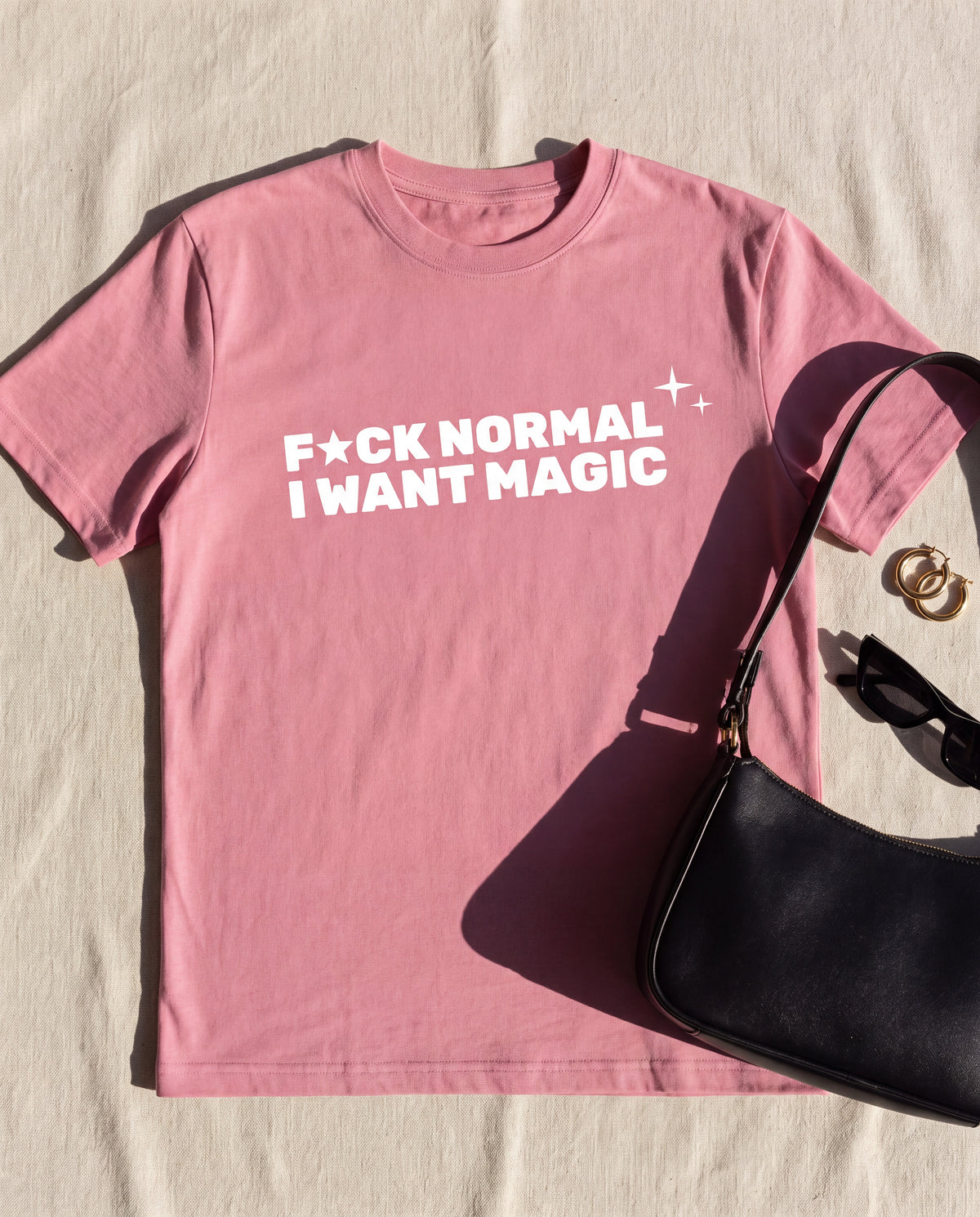 The Want Magic Tee in Pink flat lay