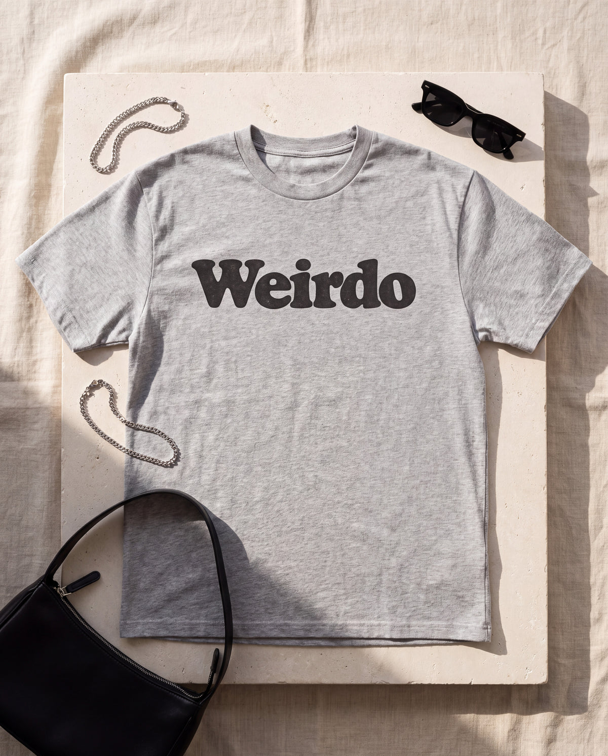 The Weirdo Tee in Grey, flat lay