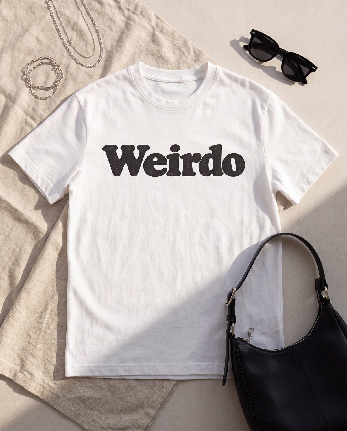 The Weirdo Tee in White, flat lay